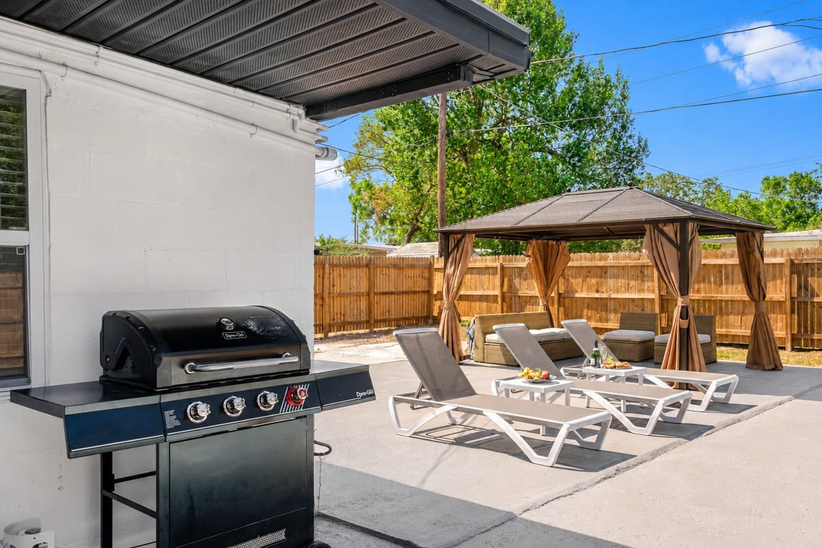 With its comfortable lounge chairs, elegant canopy, and inviting outdoor furniture, you'll never want to leave this tranquil oasis.