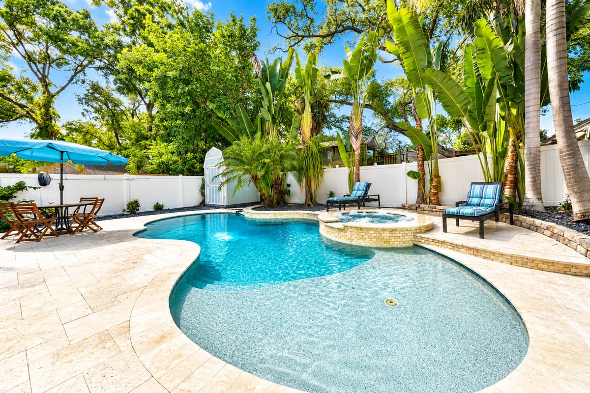 Cool off in the refreshing pool or unwind in the attached spa, all within your own private backyard retreat.