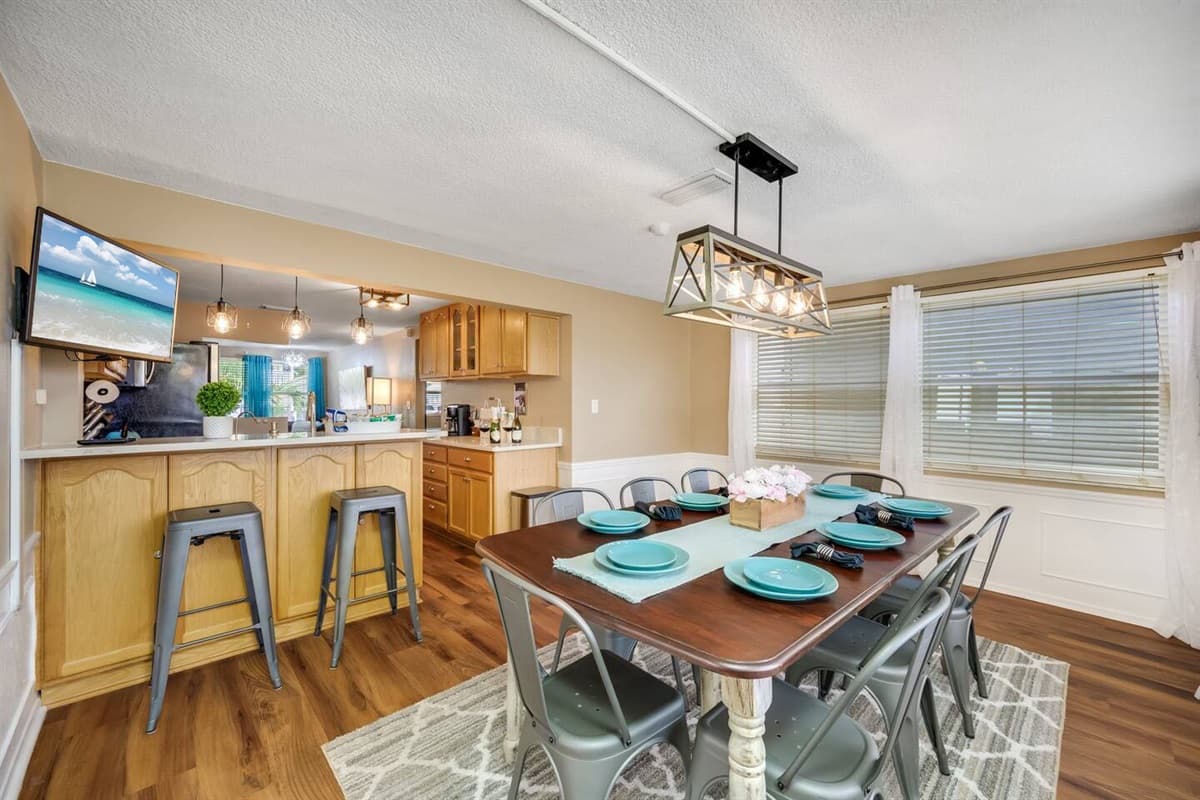 This open concept of our beautiful dining area and modern fully equipped kitchen  is perfect for you and your group. Cherish this time with family and friends while on vacation. 