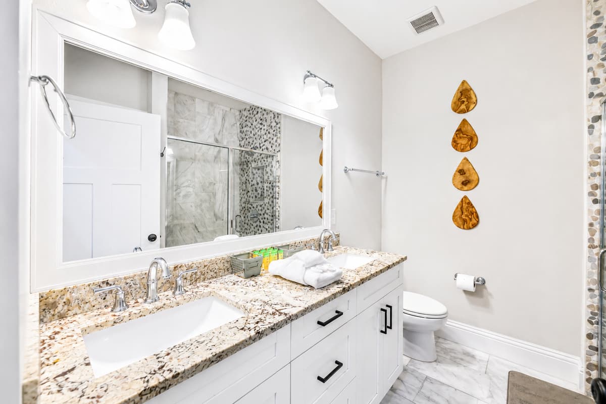 Enjoy extra counter space with a dual-sink vanity, perfect for families or groups getting ready together.