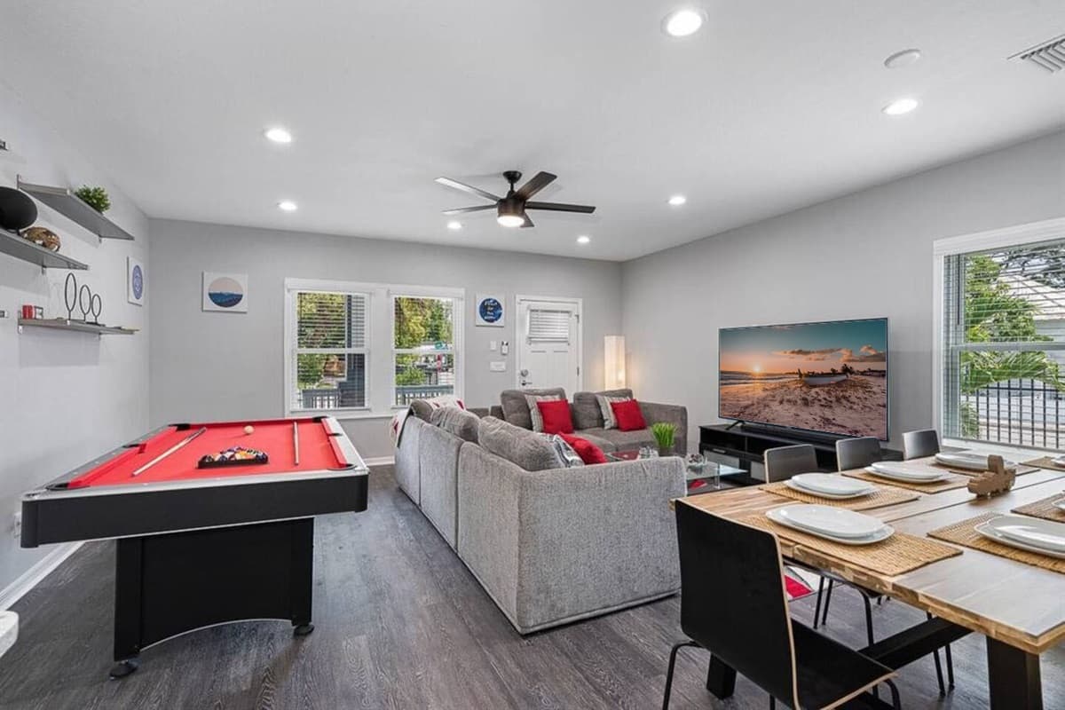 As you step into this enticing recreational area beside the living area, the pool table convertible to a ping pong table takes center stage, inviting you to embrace the thrill of gaming.