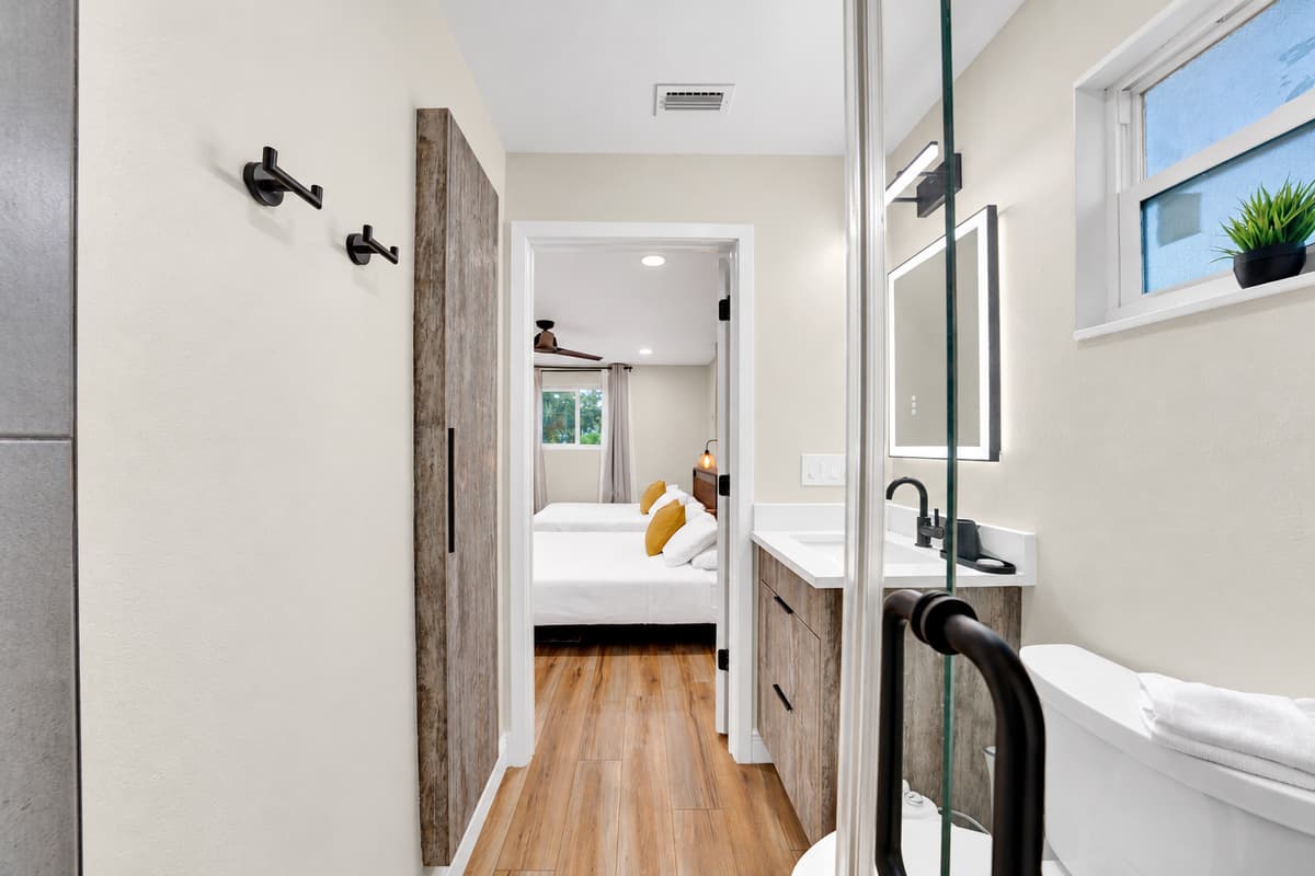 Bedroom, bathroom, and nothing in between. Your own bath opening directly off the room, so mornings start without a hallway, a queue or a conversation with anyone else in the house.