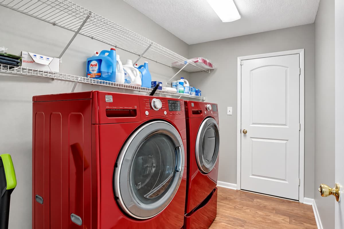 This is our laundry space, complete with a washer and dryer, as well as all the essential tools for your laundry needs.