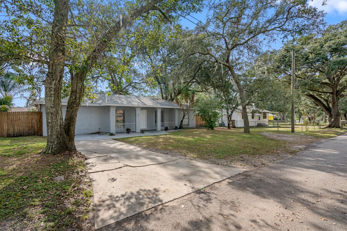 The beautiful front view of the house showcasing our magnificent front yard and driveway. If you are interested in this property, don't hesitate to send us an inquiry as soon as possible!