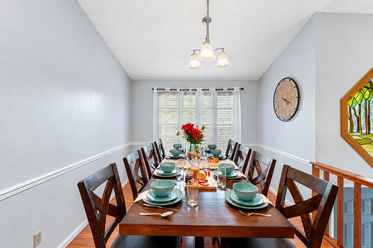 Set against a backdrop of warm wood floors and soft neutral tones, this space seamlessly blends rustic character with modern elegance.