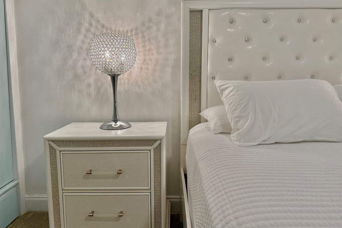 With luxe touches and a calming color palette, this bedroom feels like your own private boutique getaway.
