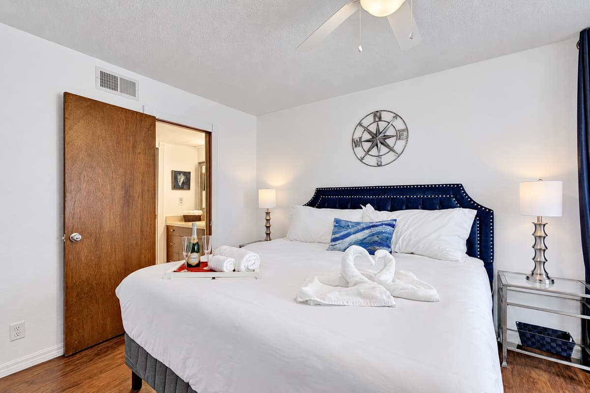 This bedroom features an ensuite bathroom, a private oasis where you can pamper yourself in style.