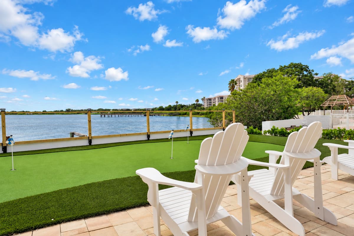 Pull up a chair and watch the water. Adirondack chairs line the edge of the patio facing the putting green and bay. The best seats are outside.