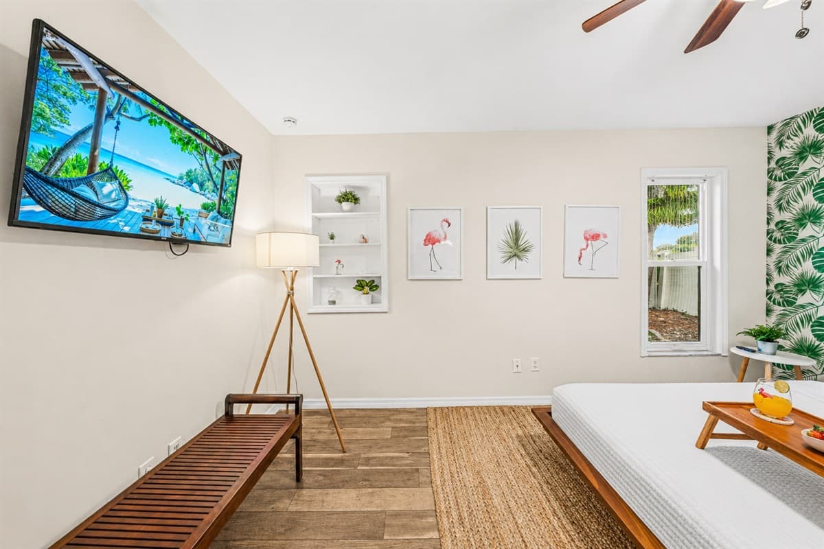 Bright and airy layout with natural light, comfortable furnishings, and stylish coastal décor.