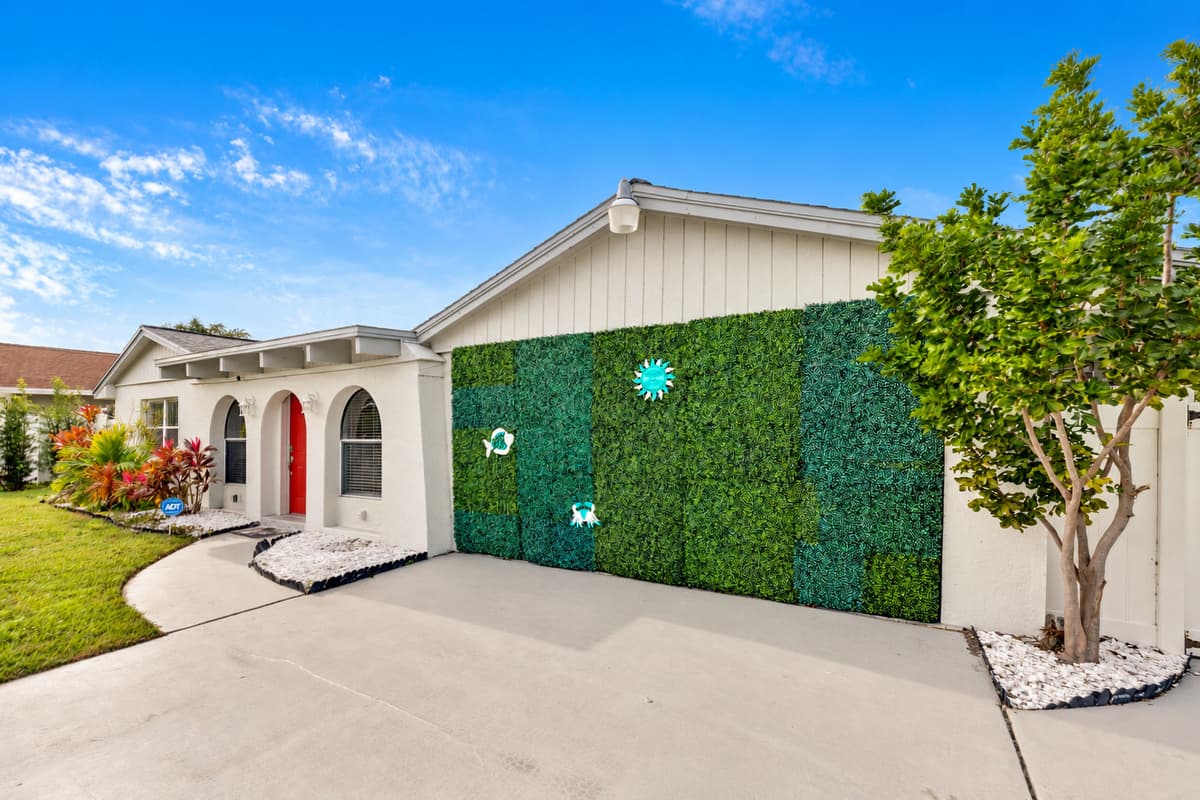Feel the allure of classic design and enjoy the convenience of a spacious driveway.