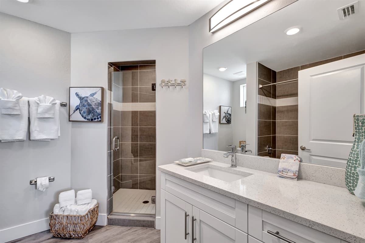Step into a bathroom oasis that embodies modern elegance and pristine functionality.