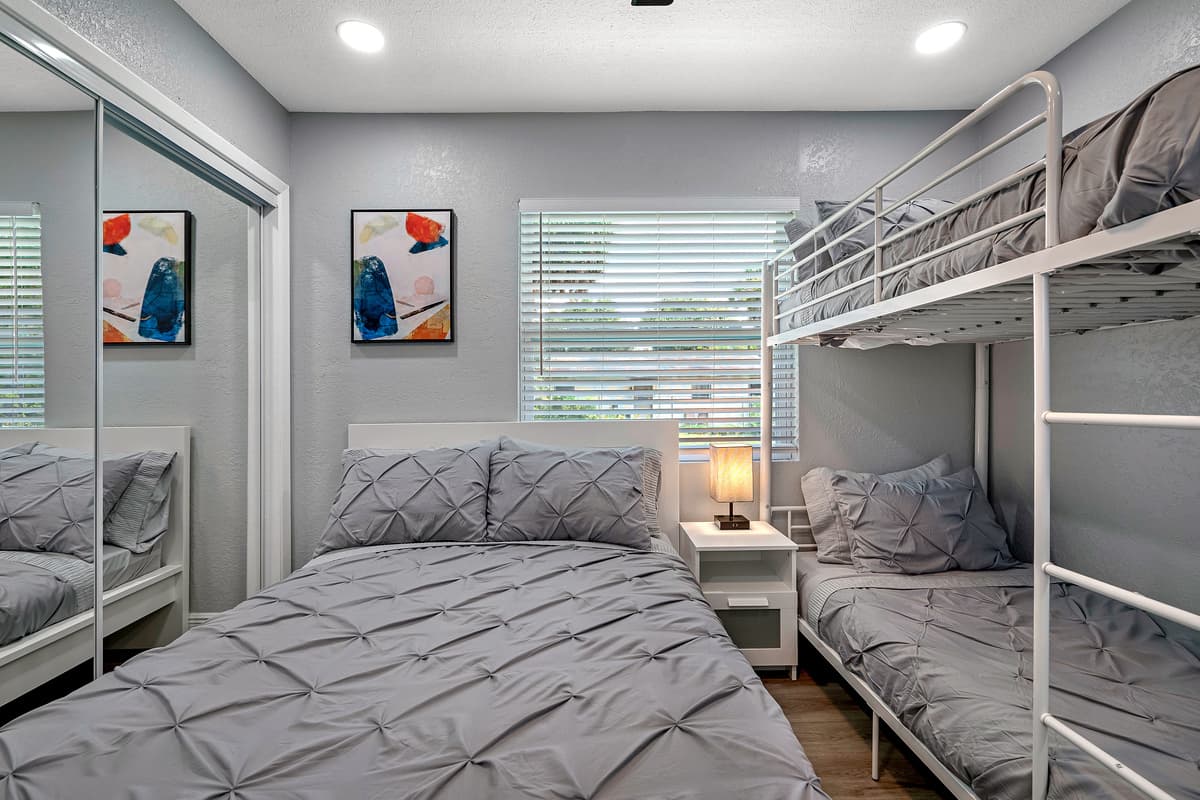 Kids will sure love this elegant bedroom for sleepovers! It has a queen sized bed, single bunkbed, drawers, and a smart TV!