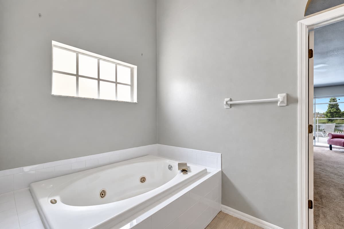 Embrace the peacefulness of this exquisite bathroom, where relaxation and rejuvenation intertwine to create a truly indulgent retreat.