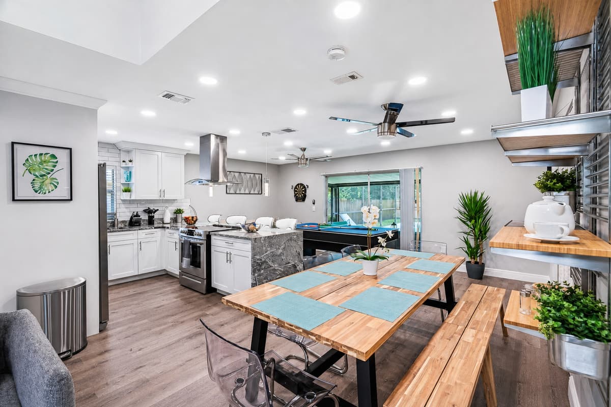 Open view of our beautiful dining area, fully equipped kitchen and play area that has ping-pong table. Never run out of activities while staying at our stunning property! Send us an inquiry as soon as possible!