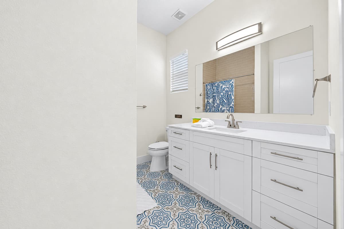 Bathroom 2: double vanity provides extra room for two guests to get ready.