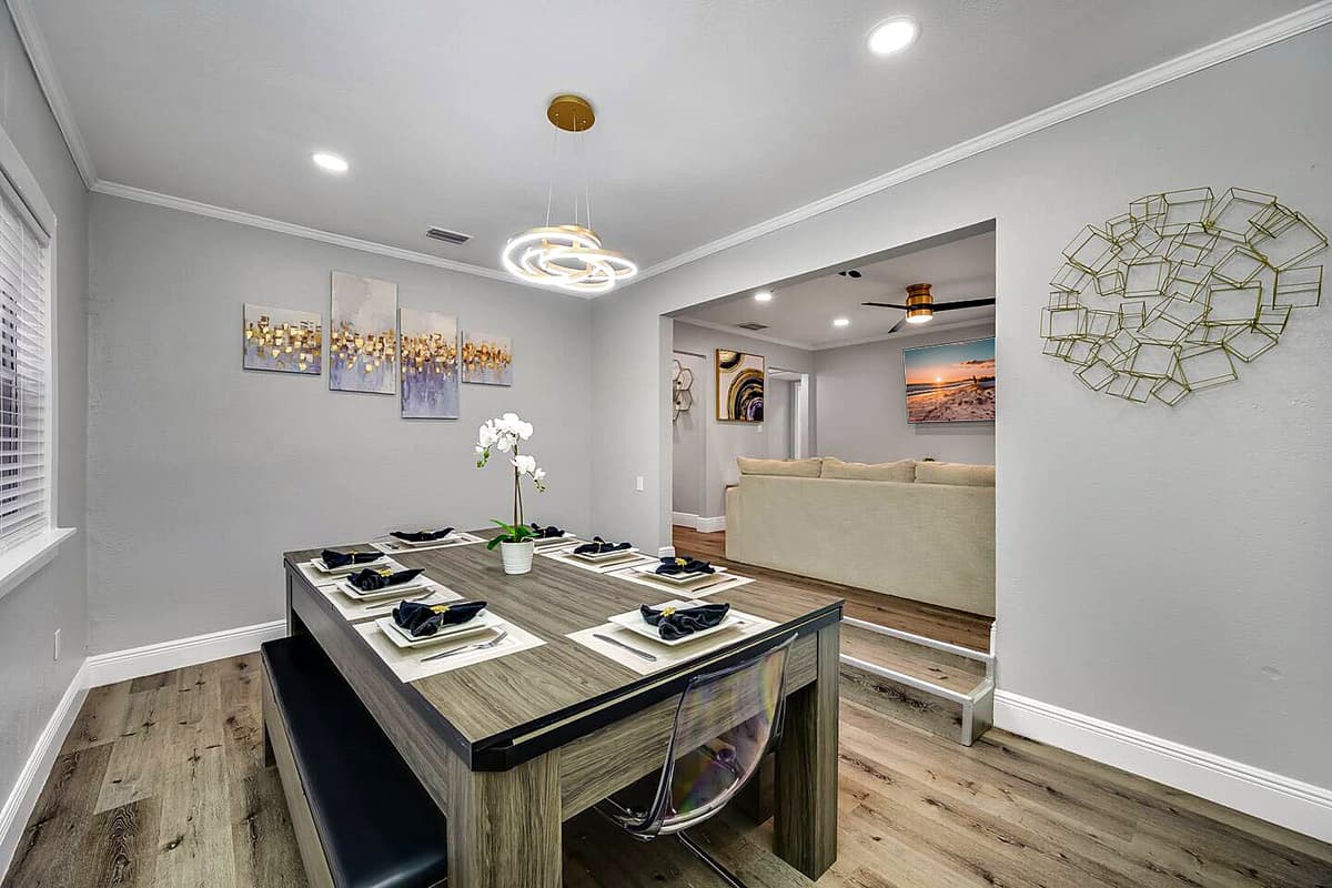 This stunning dinning table seats 8 people. Enjoy  home cooked food straight from the stove or oven while reminiscing happy memories with family and friends. Send us a message now!