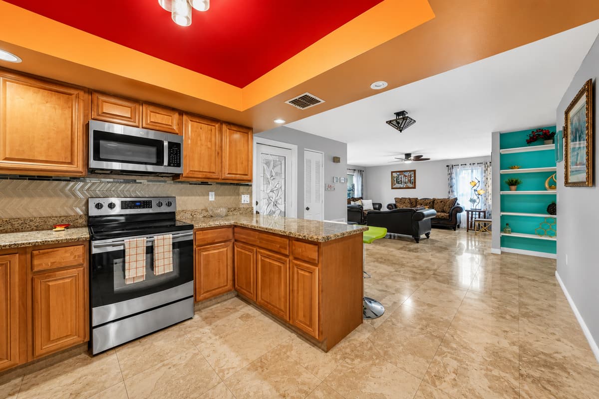 Spacious design seamlessly connects the kitchen to the home's living and dining areas.