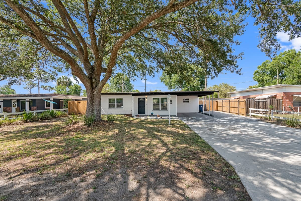 Nestled amidst a lush, green landscape, our charming house exterior is a sight to behold.