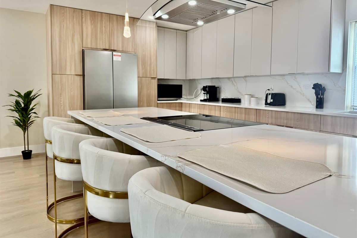 With seating for four at the island, this kitchen invites connection and comfort.