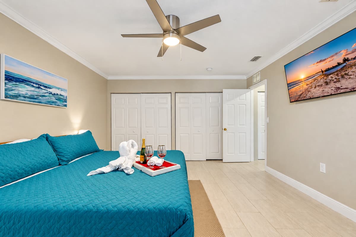 The spacious and inviting king bed serves as the focal point of the room, ensuring a restful sleep experience for a truly rejuvenating stay.
