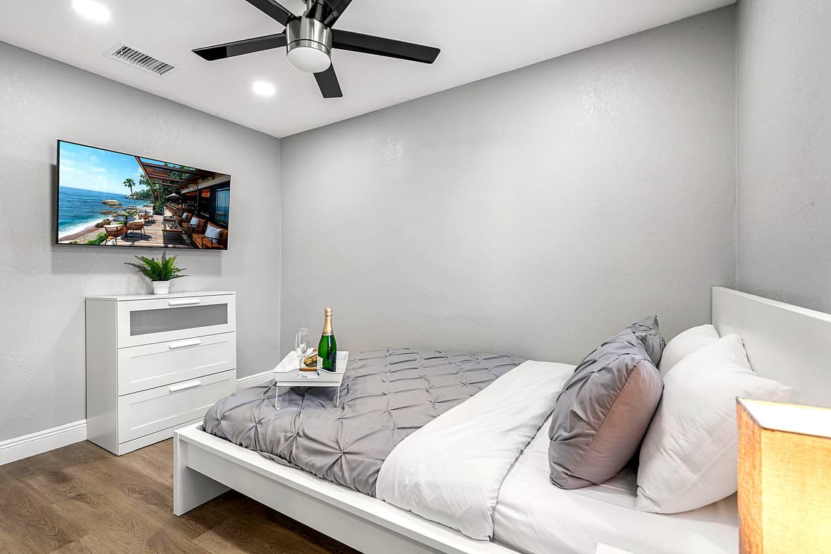 Whether you're enjoying a peaceful night's sleep or a lazy morning in bed, this bedroom is a haven of tranquility.