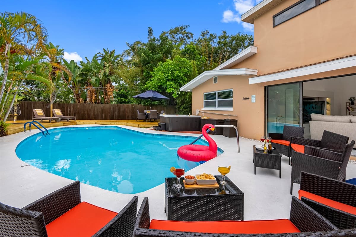 This backyard paradise is the heart of the home—designed for entertaining, relaxing, and soaking up the Florida sunshine.