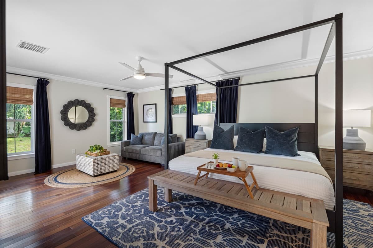 Elegant retreat with warm wood floors, stylish décor, and private lounging space.