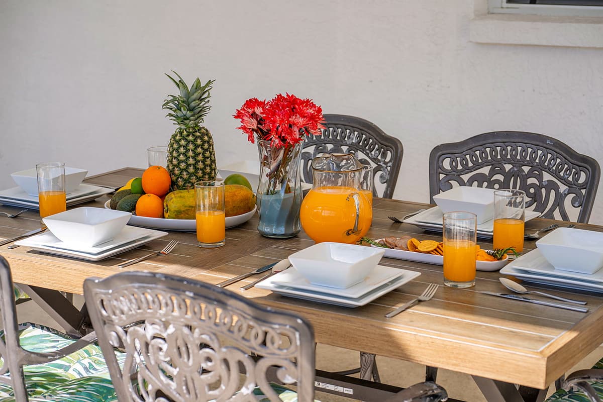 Whether you're savoring a morning coffee, indulging in a leisurely lunch, or gathering for an evening meal under the stars, the serene atmosphere enhances every dining experience.