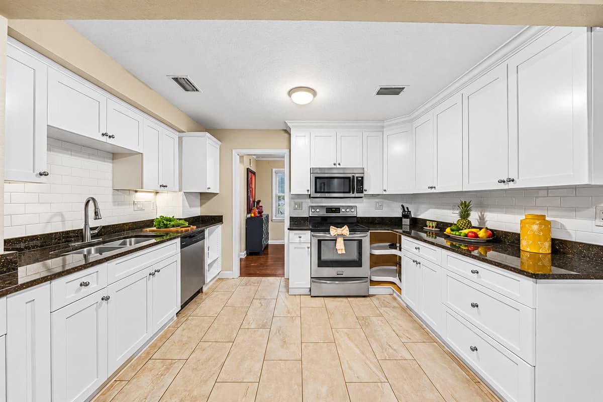 Expansive kitchen layout with plenty of prep space, perfect for group cooking and entertaining.