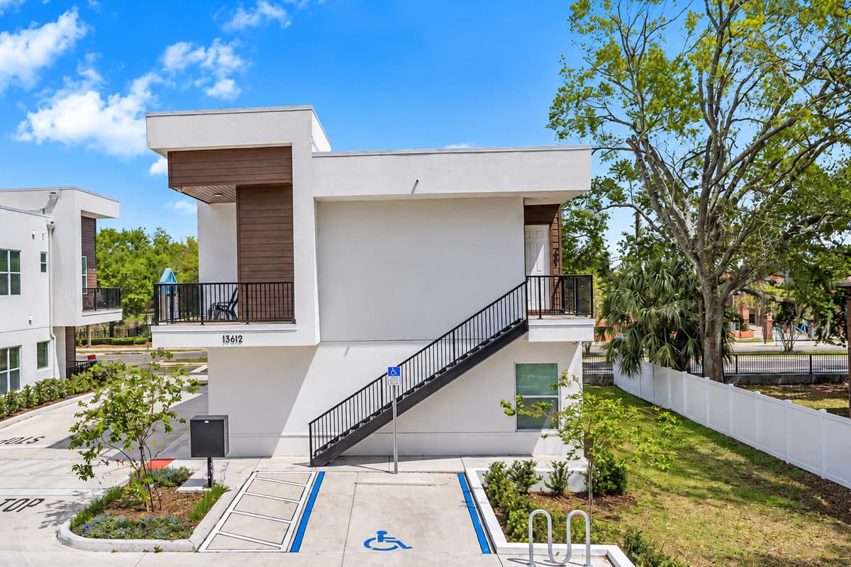 Clean, modern, and secure. Exterior security cameras, smart-lock entry, and lit parking give peace of mind from arrival to checkout. Bright white walls and fresh landscaping make it feel welcoming, not institutional.
