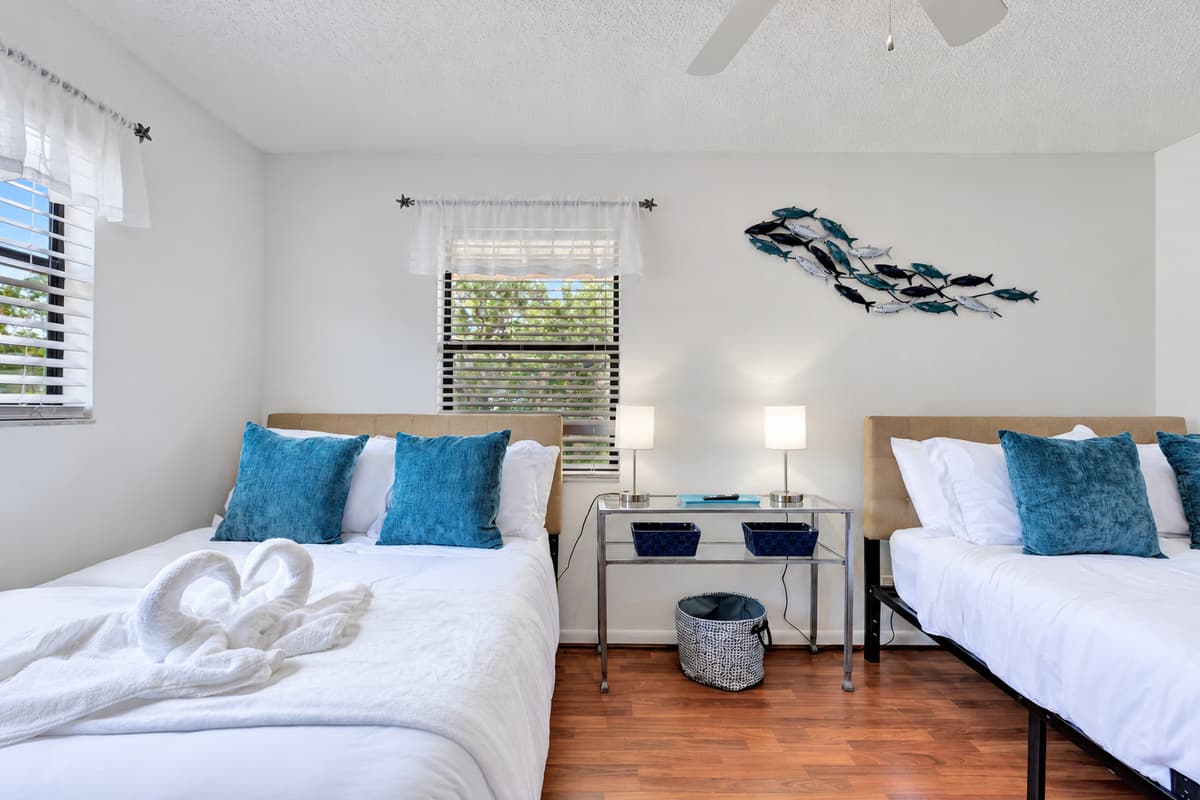 This room is designed to accommodate your needs, featuring not one, but two queen-size beds, making it ideal for families, friends, or groups traveling together.