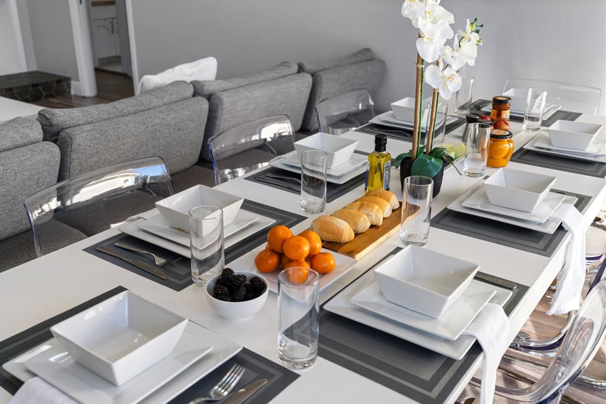 Gather for meals in a bright, open dining space that embraces the indoor-outdoor lifestyle.