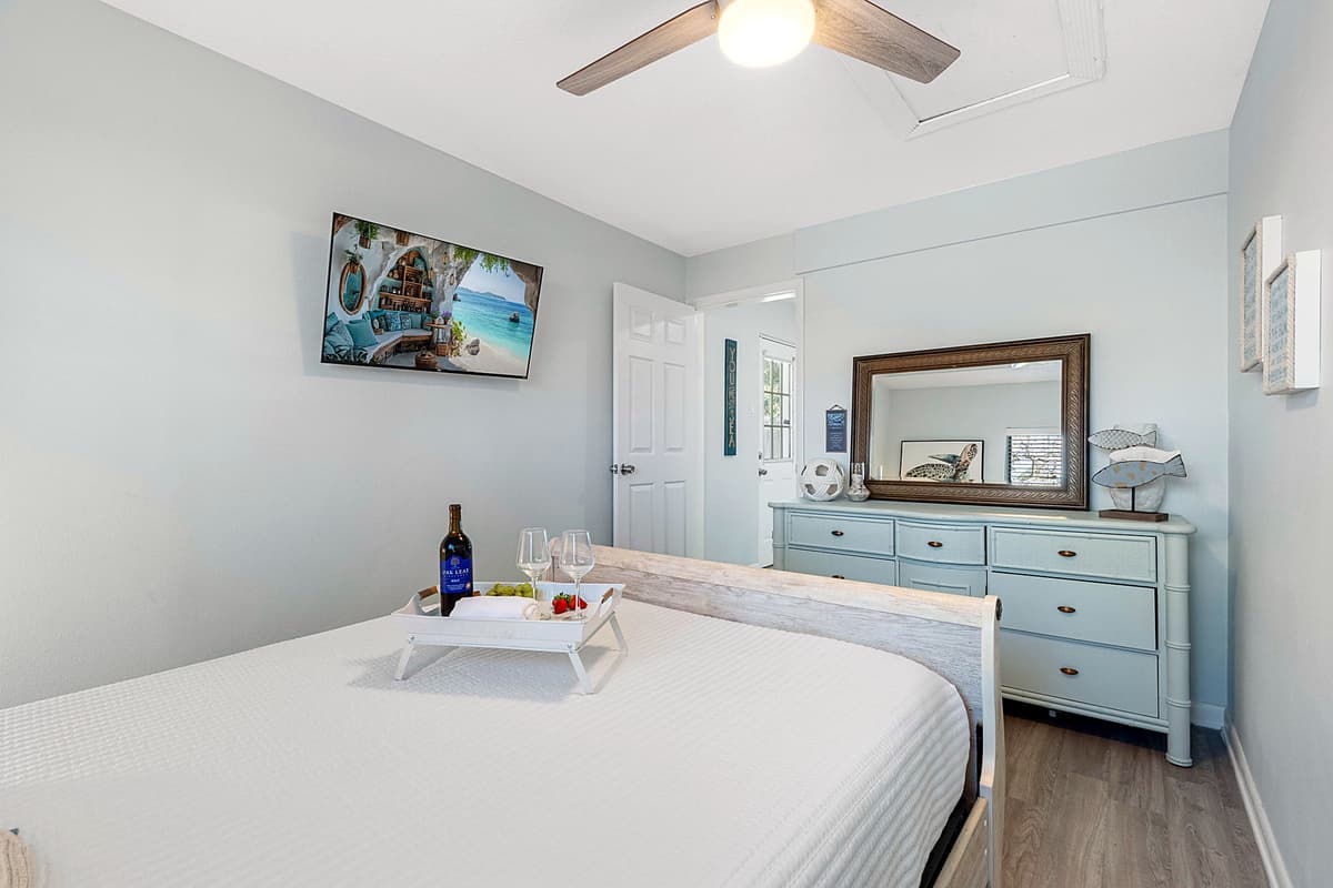The suite also includes ample storage, with closets and drawers to keep your belongings organized and accessible.