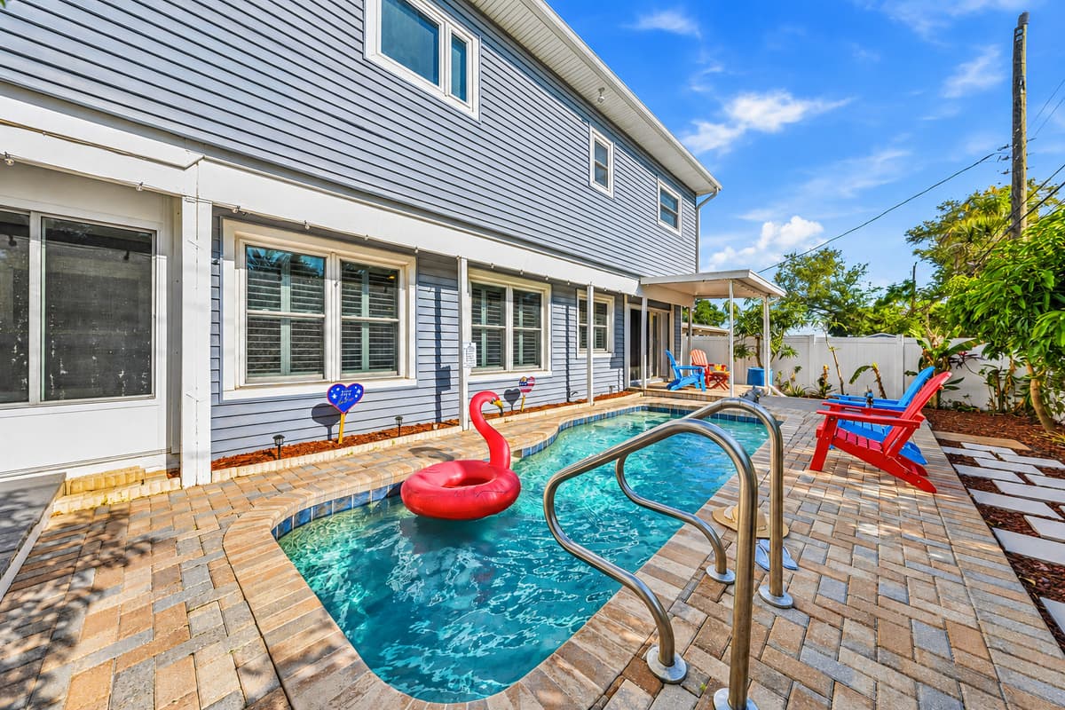 Private pool with surrounding patio and lounge chairs—perfect for cooling off on warm days 