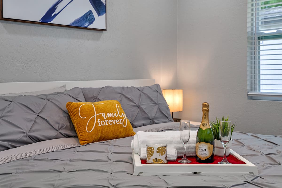 Feel safe and comfortable during your stay while making beautiful memories with family and friends. This comfortable bedroom has a queen size bed, drawers, and smart TV.