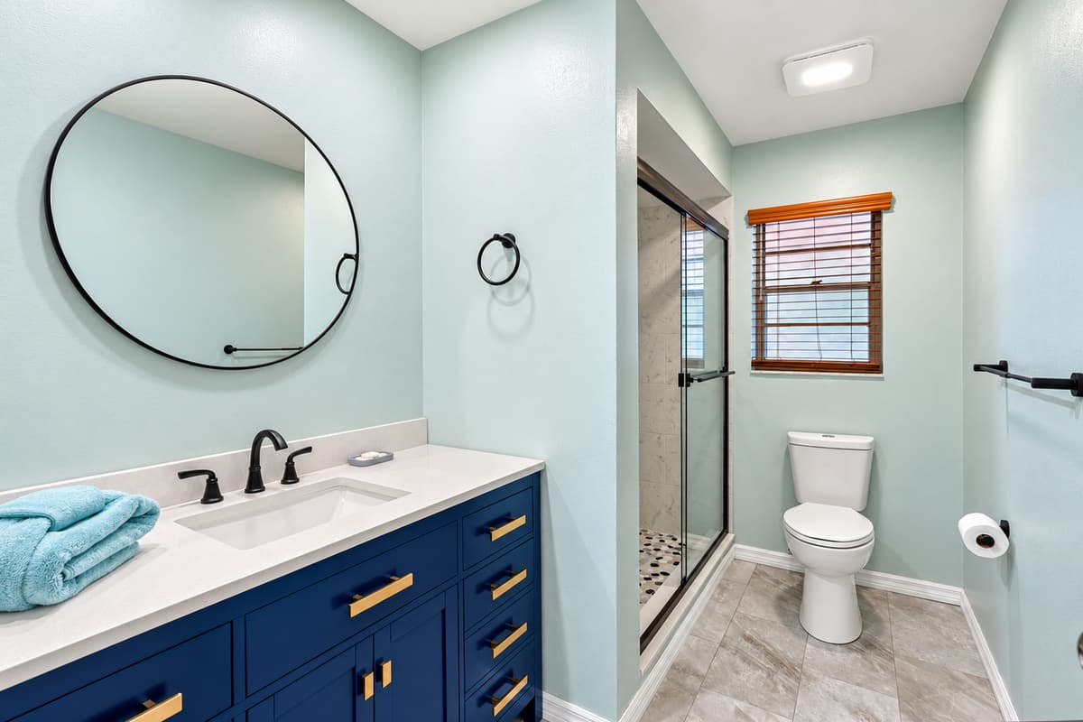 The second bathroom offers a clean, stylish, and functional space designed to meet the needs of all guests.