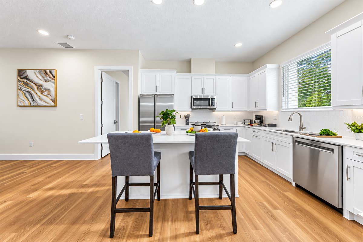 Kitchen with bar seating and open design—ideal for casual meals and socializing.