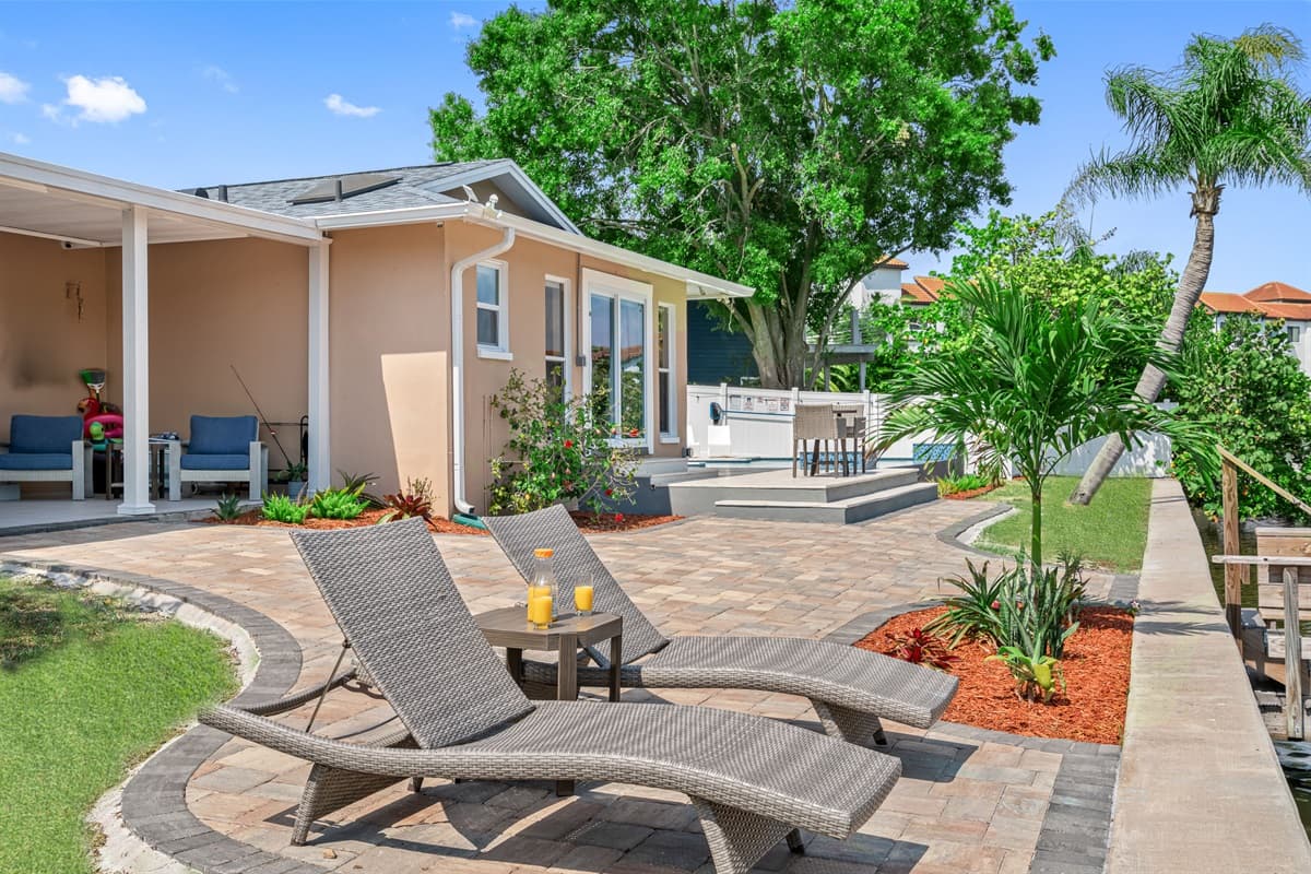 As day turns into night, the outdoor common area and patio transform into a magical oasis.