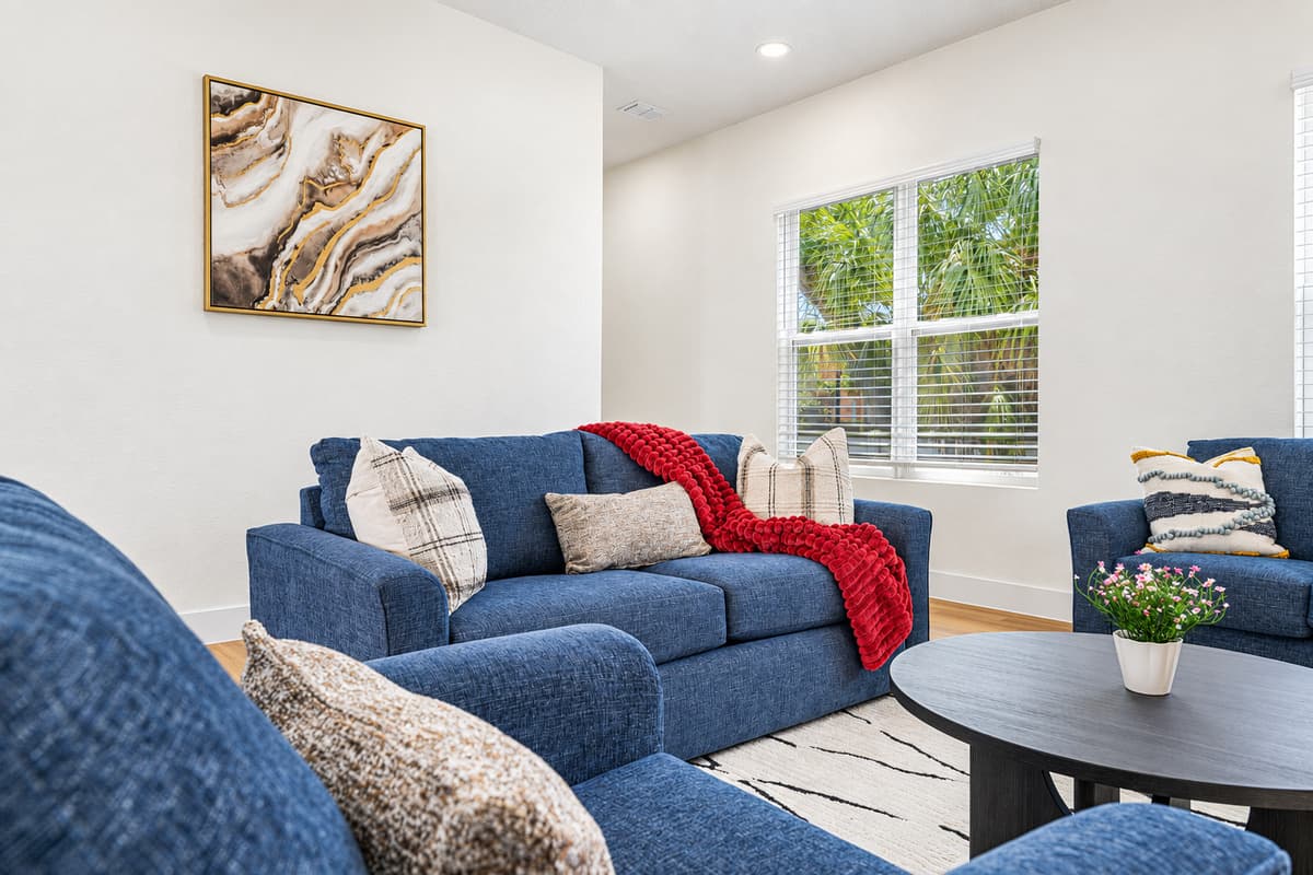 Close-up of comfortable seating with modern accents and relaxing ambiance.