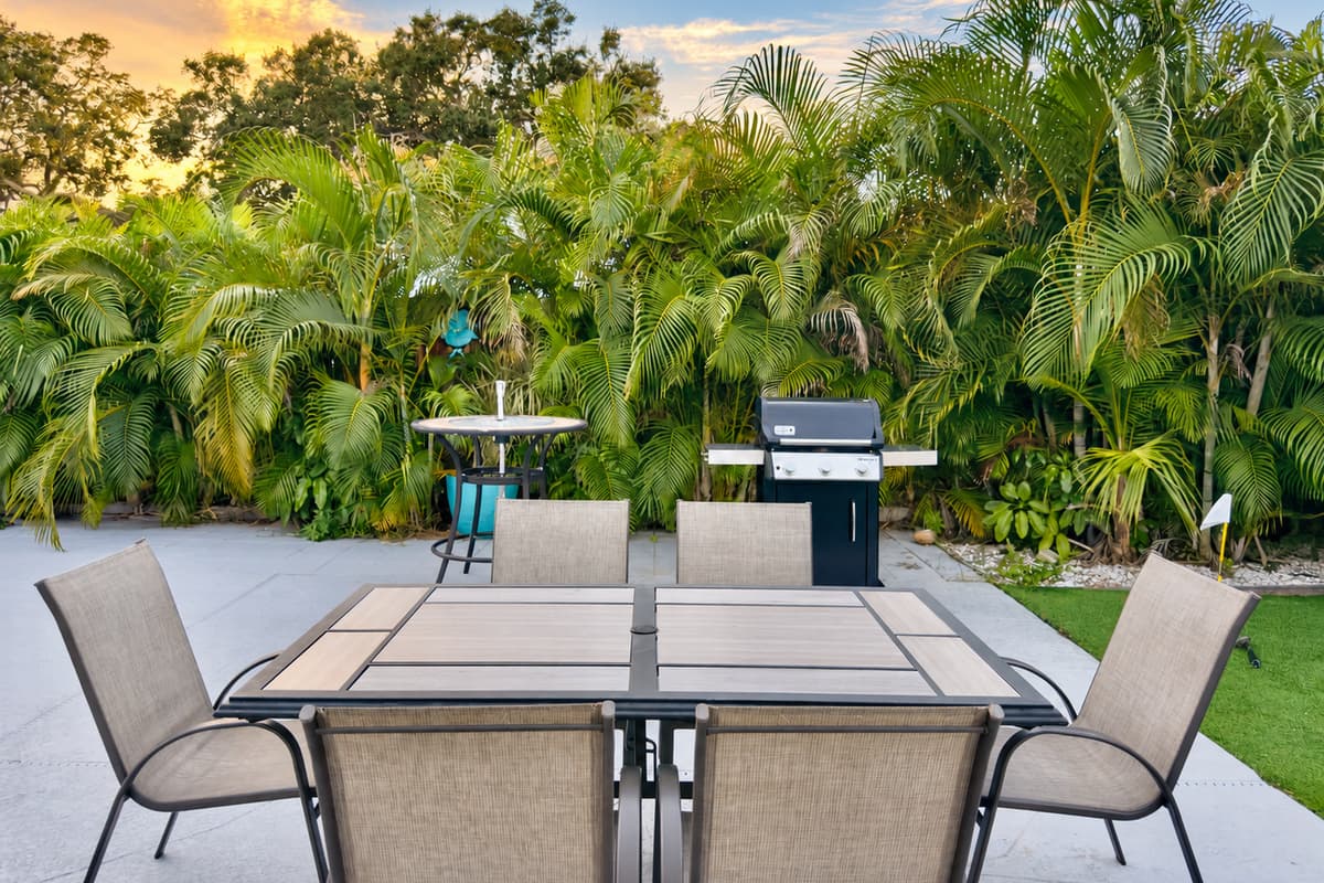 Ample seating lines the pool deck, offering plenty of space for group gatherings or quiet relaxation.