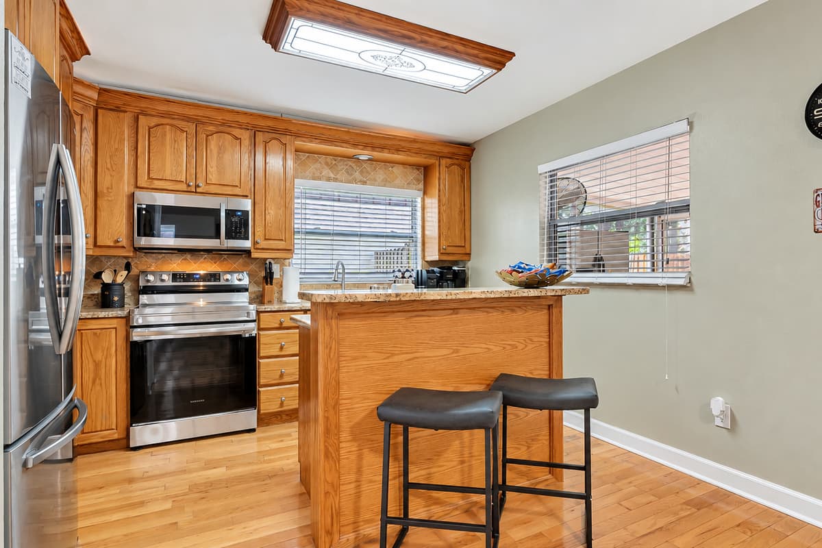 Nestled in a cozy corner, you'll find a charming breakfast table for two. 