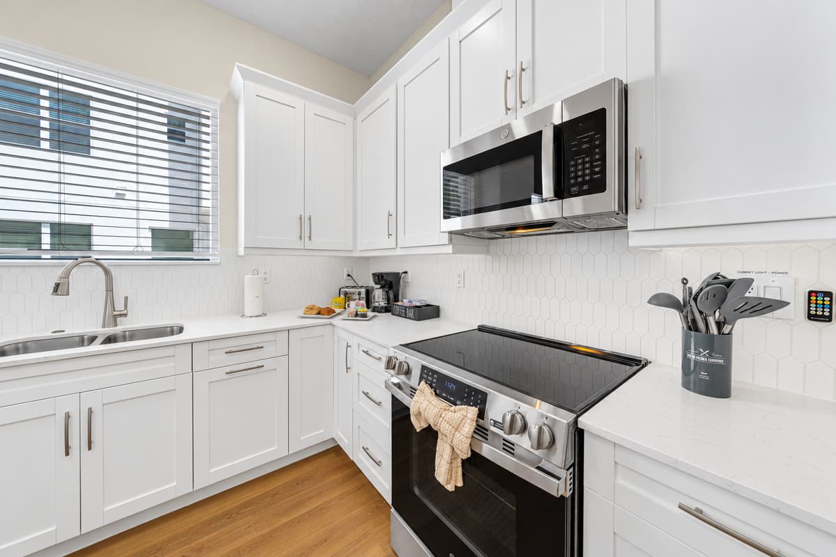 Everything you need to cook your favorite meals: full-size stove, refrigerator, and generous counter space.