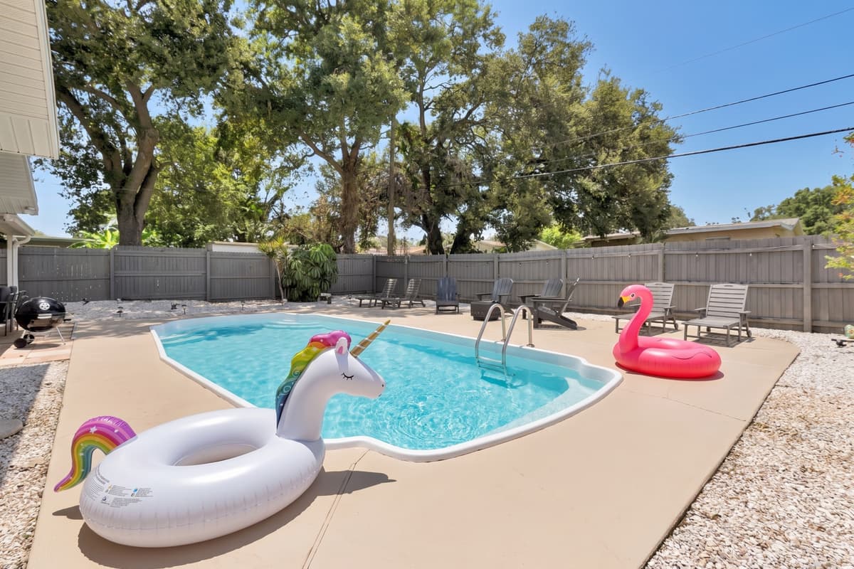 A private in-ground pool inside a fully fenced yard — no resort deck, no crowds, no waiting on a chair. It's yours from check-in to check-out, every single hour of every day.