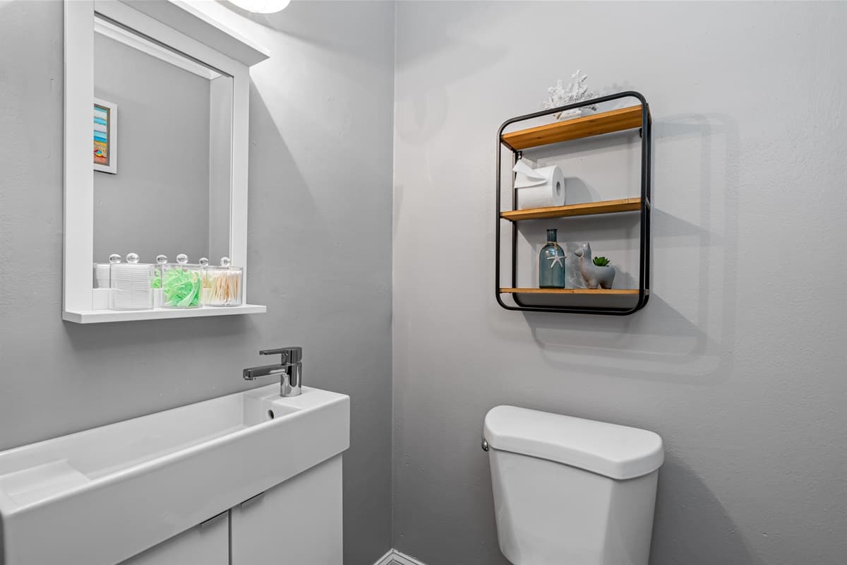 Step into a world of blissful indulgence with our breathtaking half bathroom.