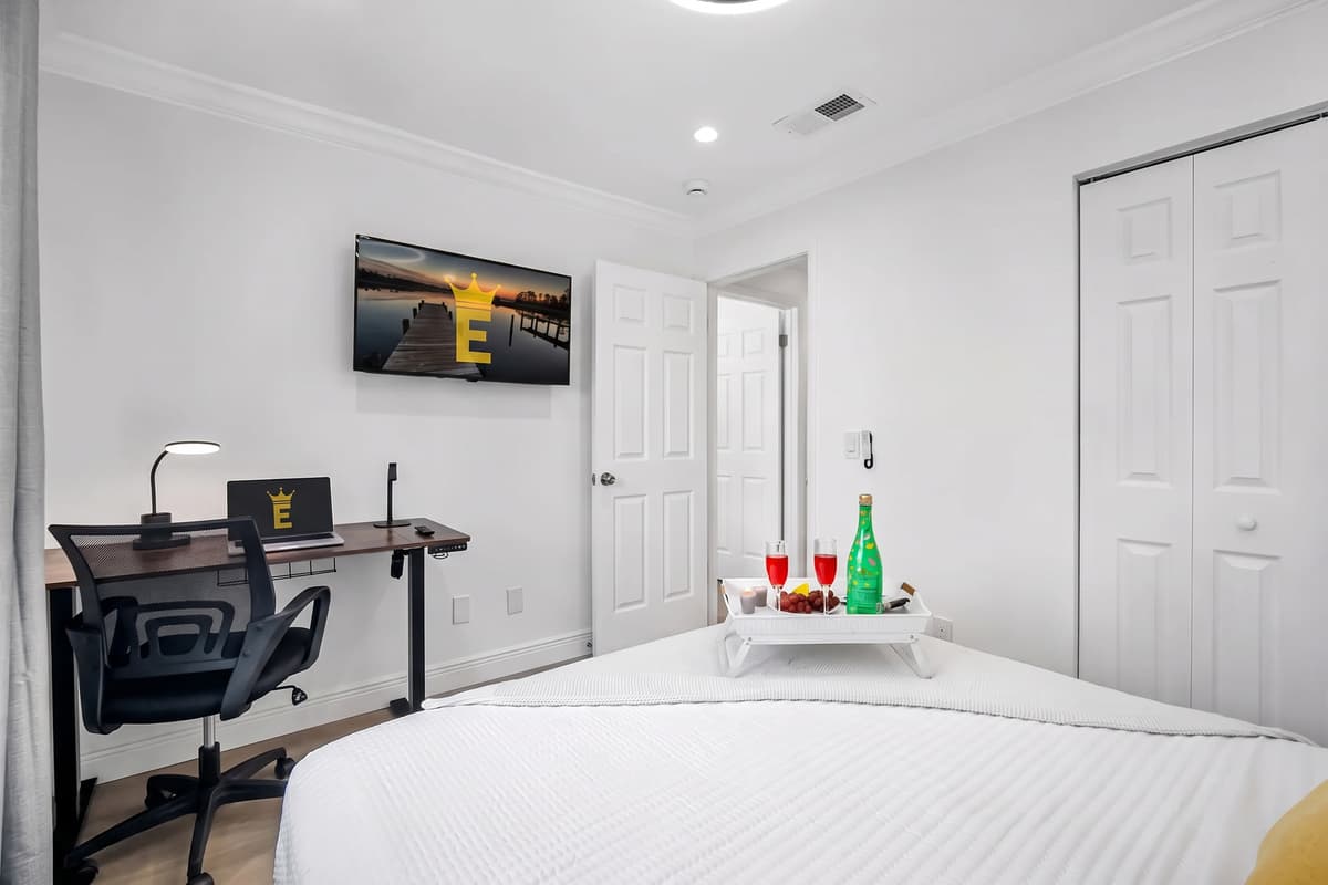 Tucked away for privacy, this bedroom offers a peaceful setting for rest, reading, or remote work.