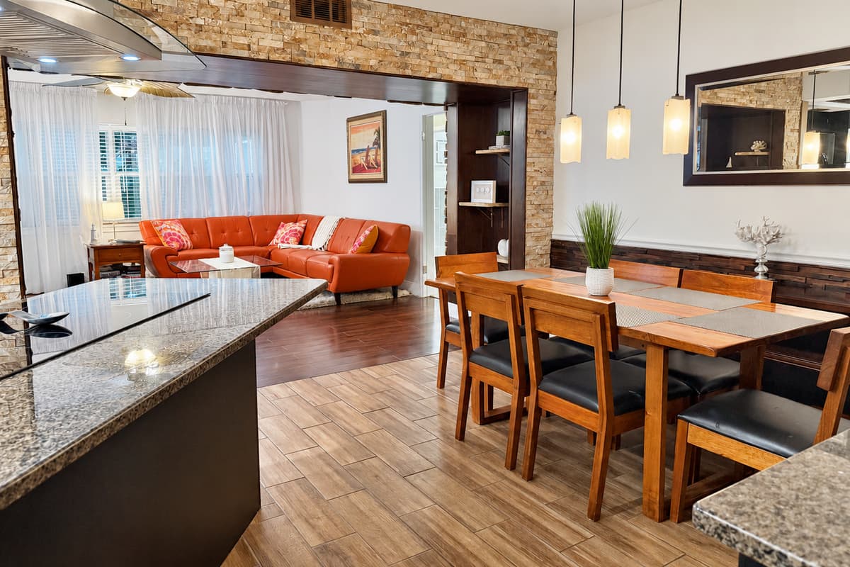 Simple yet refined, this dining space balances clean lines and warm wood elements, offering a relaxed and uncluttered place to dine or work.