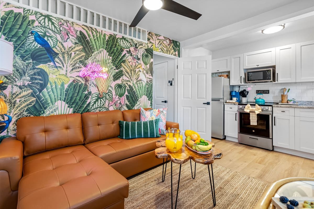 Step into the chic embrace of our Coconut Grove Tropical Haven themed living area.