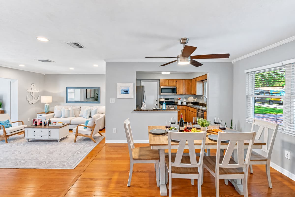 Cozy up to conversation in this light-filled dining area nestled between the living room and kitchen.