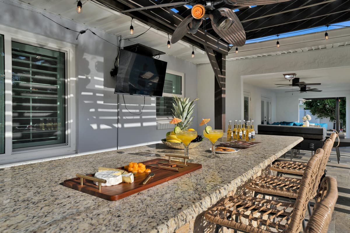 Mimosas lined up along the outdoor bar set the scene for poolside brunches under the shade of the covered lanai