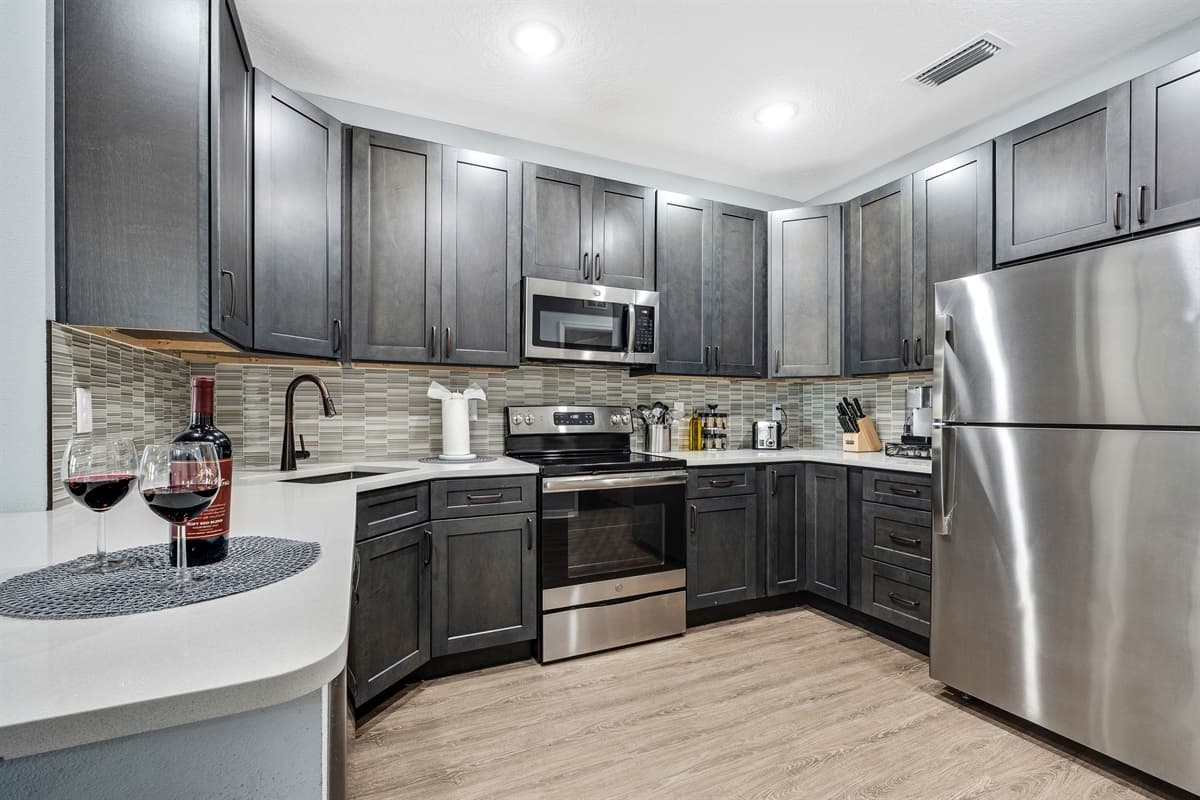 Designed with both aesthetics and practicality in mind, this kitchen invites you to explore the art of cooking with ease.